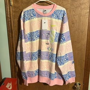 New Nike sweatshirt, three extra large steel with tags, never worn that stock.